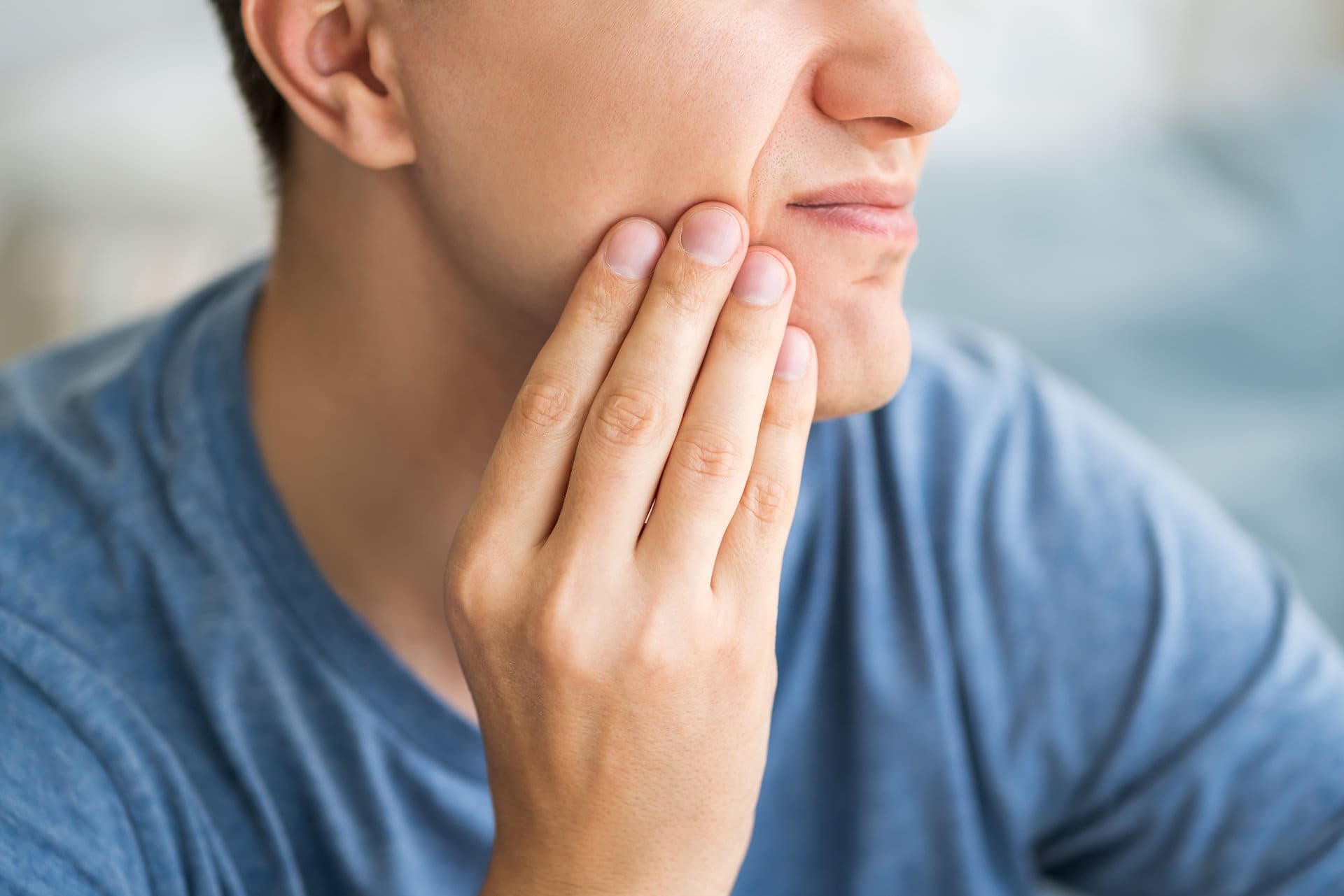 man with dental pains